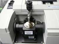 The attenuated total reflection (ATR) accessory installed on an FT-IR spectrometer.